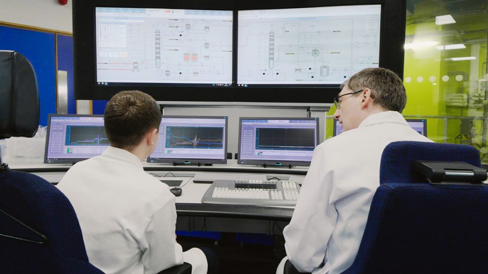 Two scientists working in Imperial's Carbon Capture Pilot Plant